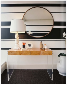 black and white stripes of varying widths create an interesting focal point for the room