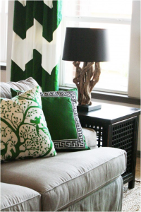 Emerald green is the color of the year for 2013. Here we show a neutral room with green curtains and pillows. From diyhomedesignpins.com